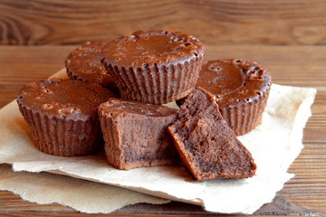 Chocolate sweet homemade cupcakes. Sweet pastries. Delicious chocolate cupcakes. Baking recipe. Closeup