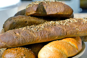 Mixture of loaves of white black and brown colour