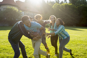 Students playing American football