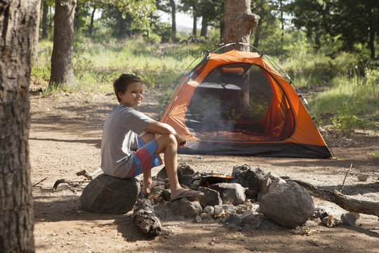 Teenage boy preparing campfire, Indiahoma, Oklahoma, USA