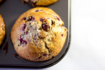 muffins in the pan on a white background