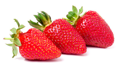 three strawberries isolated on white background close-up macro