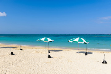 Obraz na płótnie Canvas Okinawa Beach and Parasol