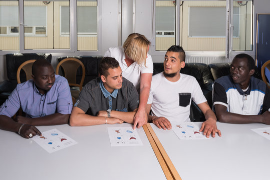 Language training for refugees in a German camp 