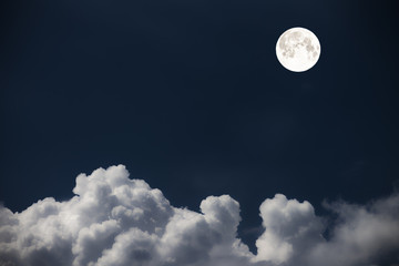 Naklejka na ściany i meble clouds the sky and the moon, a fabulous collage