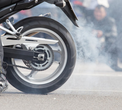 the smoke of motorcycle wheels