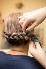 Fototapeta premium weave braids in the beauty salon