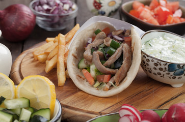 Gyros pita wrapped sandwich
