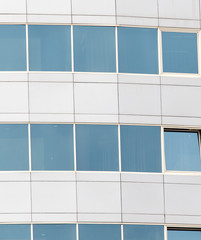 Fototapeta na wymiar skyscraper windows as background. texture