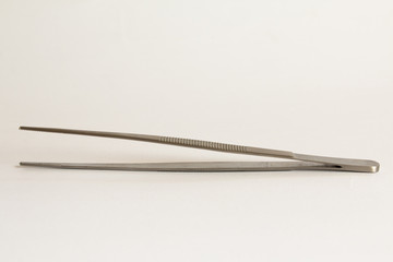 surgical instruments and tools including , forceps and tweezers White background