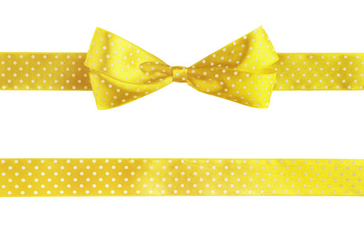 Yellow horizontal ribbons and bow, isolated on white