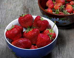 blue and brown platefuls strawberry