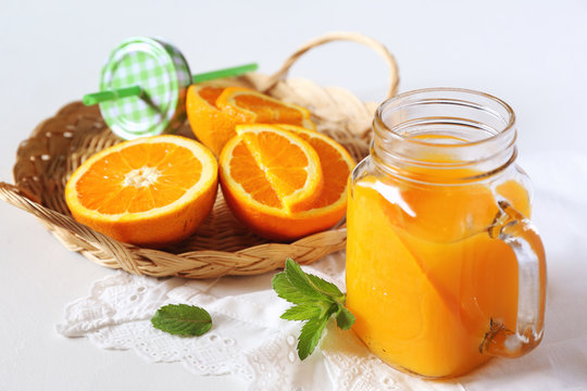 Orange juice in a glass mug