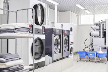 Washing machine in dry cleaning - obrazy, fototapety, plakaty