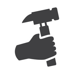 Hand holding hammer