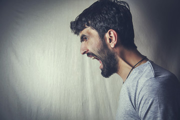 young man screaming