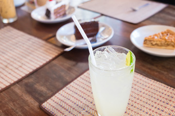 Cold fresh lemonade lime juice in glass