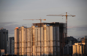 Constructing a new housing blocks in modern city scape