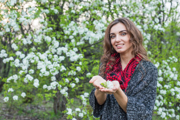 beautiful young girl with a flower 