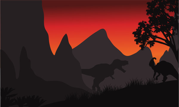 tyrannosaurus and parasaurolophus silhouette in hills