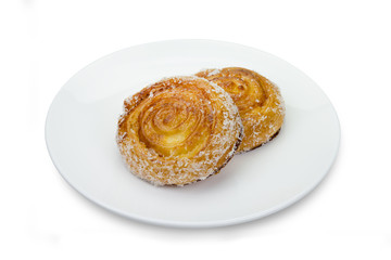 Cinnamon rolls with coconut on white background,clipping path