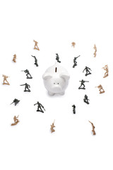 military toy soldiers defending the piggy bank