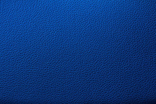 Blue leather texture. Blue leather bag. Blue leather background.