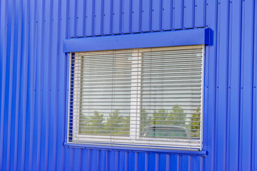 Perforated aluminum wall and window