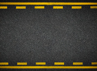 Road top view. Asphalt highway yellow line marks.