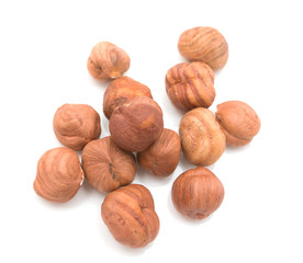 hazelnut kernels on a white background