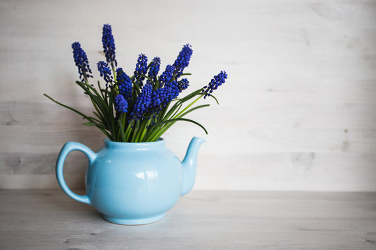 Blue Flowers In A Vase. Vintage