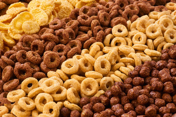 Cereals breakfast collection. Corn rings, balls and cornflakes.