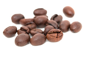 roasted coffee beans on a white background