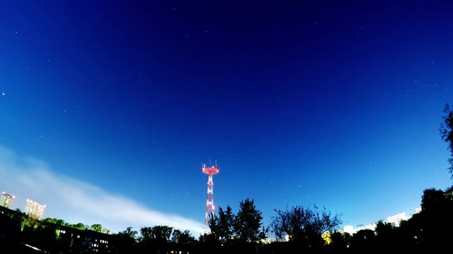 TIME-LAPSE: Night sky over a town