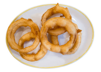 fried onion rings on white plate