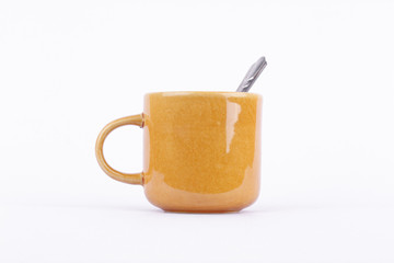 Coffee cup and spoons on break time in white background isolated 