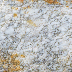 Surface of the marble with brown tint, stone texture and background. Imagination of the nature.