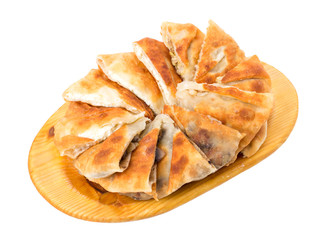 Delicious sliced puff pie with chicken breast.