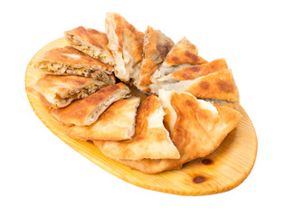 Delicious sliced puff pie with chicken breast.