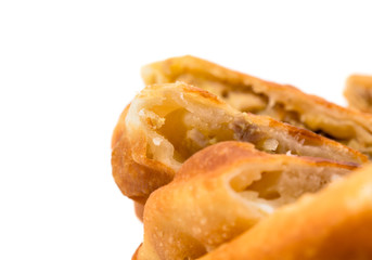 Delicious sliced puff pie with chicken breast.