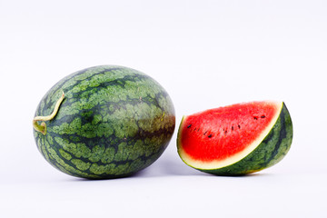 Watermelon is a healthy sweet fruit on the white background isolated 