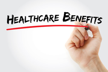 Hand writing Healthcare Benefits with marker, health concept background
