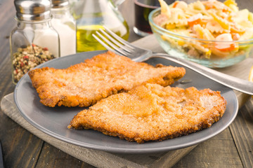 fillet breaded and fried veal; in dish
