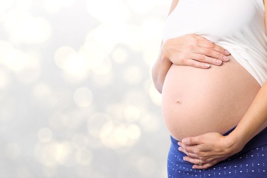 Composite image of pregnancy woman 