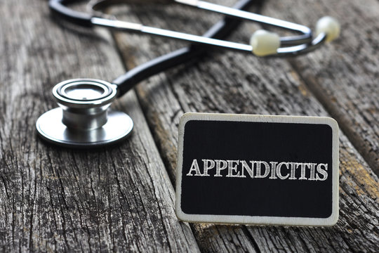 Medical Concept-APPENDICITIS word written on blackboard with Ste