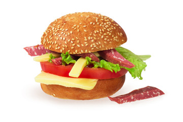 Italian burger with pepperoni, cheese and tomato. Isolated on white background. Sandwich with sausage, cheese and vegetables.