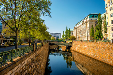 Water channel with Zollamtssteg bridge in residential district in Vienna