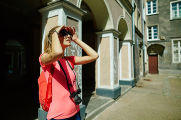 Fototapeta premium Beautiful girl tourist in the city