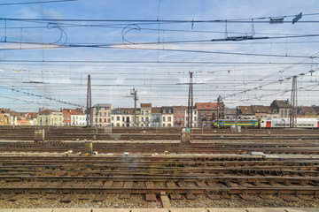Fototapeta na wymiar Brussels South railway station, Belgium. Picture was taken through the window of the train when it was about to leave the station.