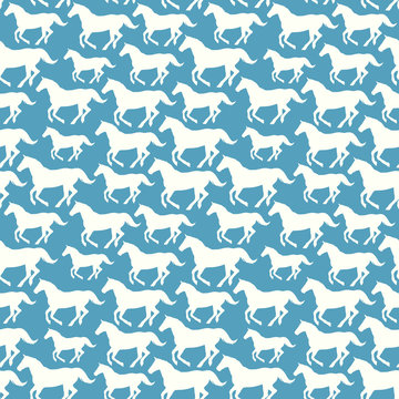 Seamless pattern with hand drawn silhouette horses